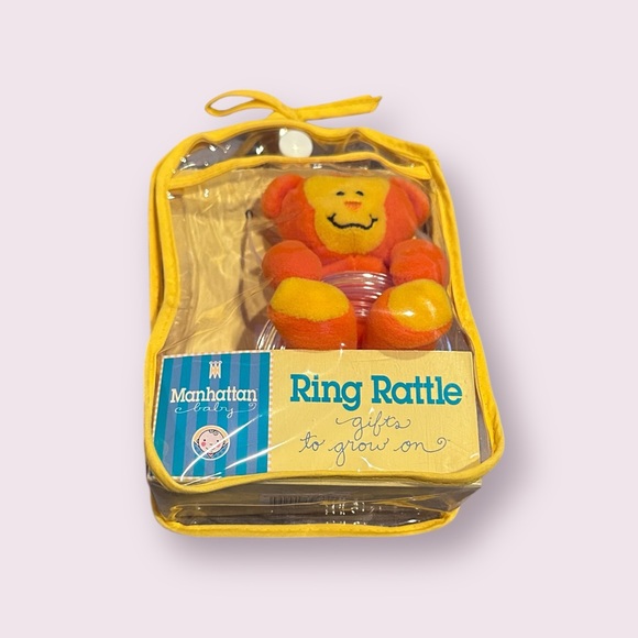 manhattan toy Other - Vintage New In Package Manhattan Toy Monkey Orange And Yellow Ring Rattle Plush